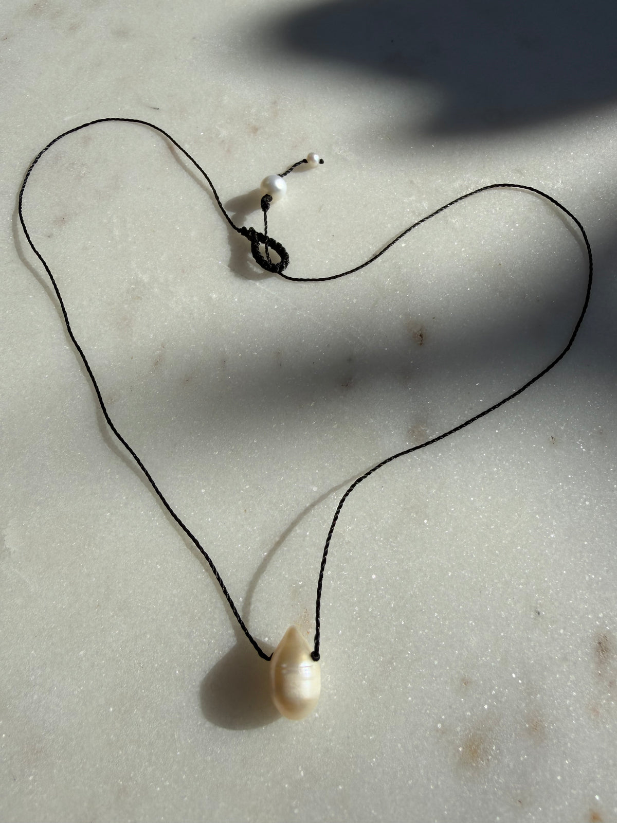Future Nomads Necklaces Black Thread Pearl Drop