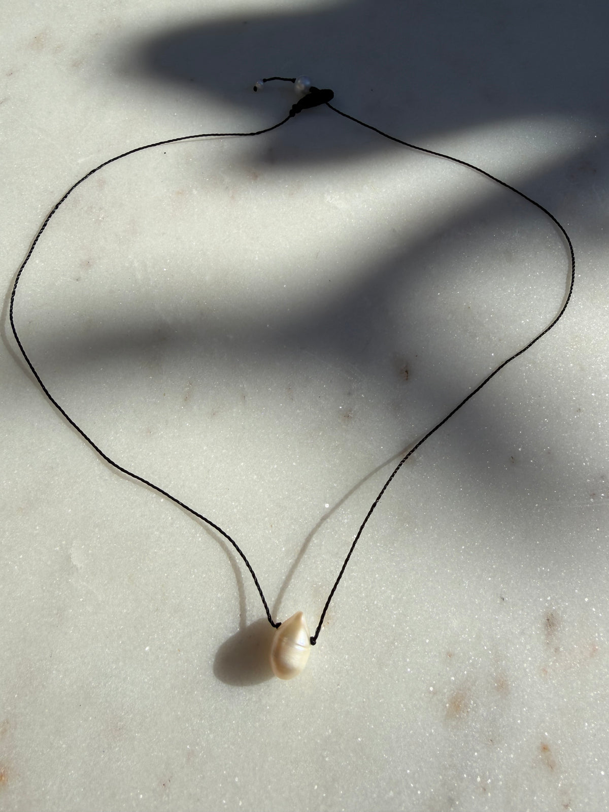 Future Nomads Necklaces Black Thread Pearl Drop