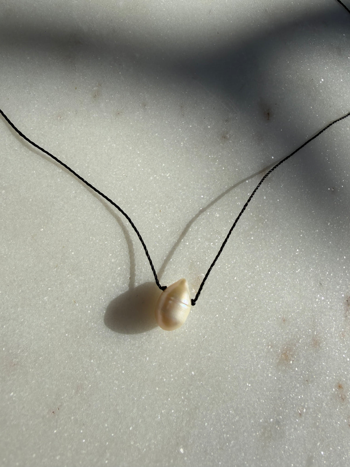 Future Nomads Necklaces Black Thread Pearl Drop