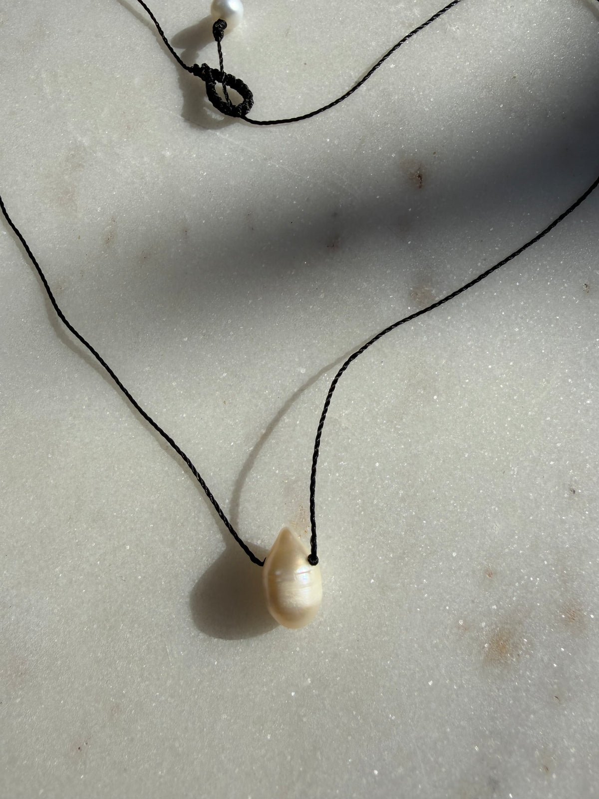 Future Nomads Necklaces Black Thread Pearl Drop