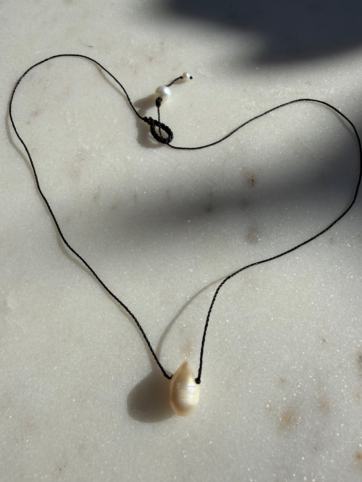 Future Nomads Necklaces Black Thread Pearl Drop