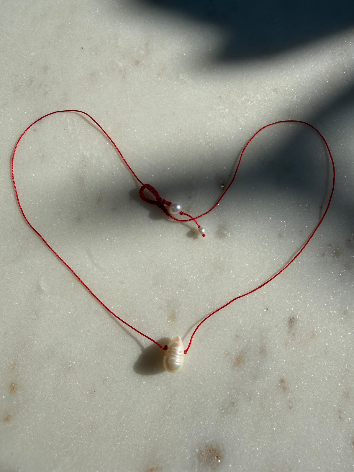 Future Nomads Necklaces Red Thread Pearl Drop