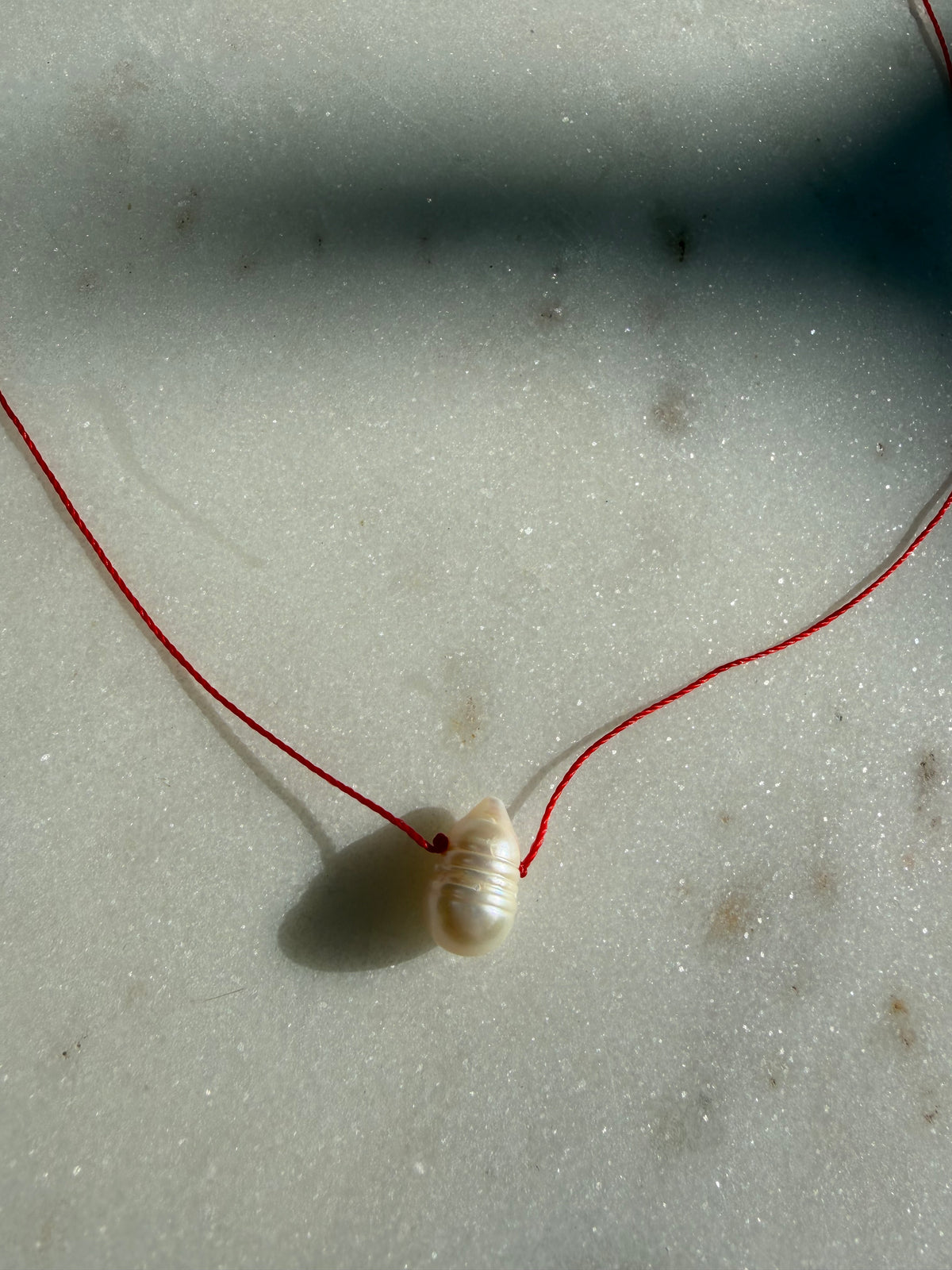 Future Nomads Necklaces Red Thread Pearl Drop