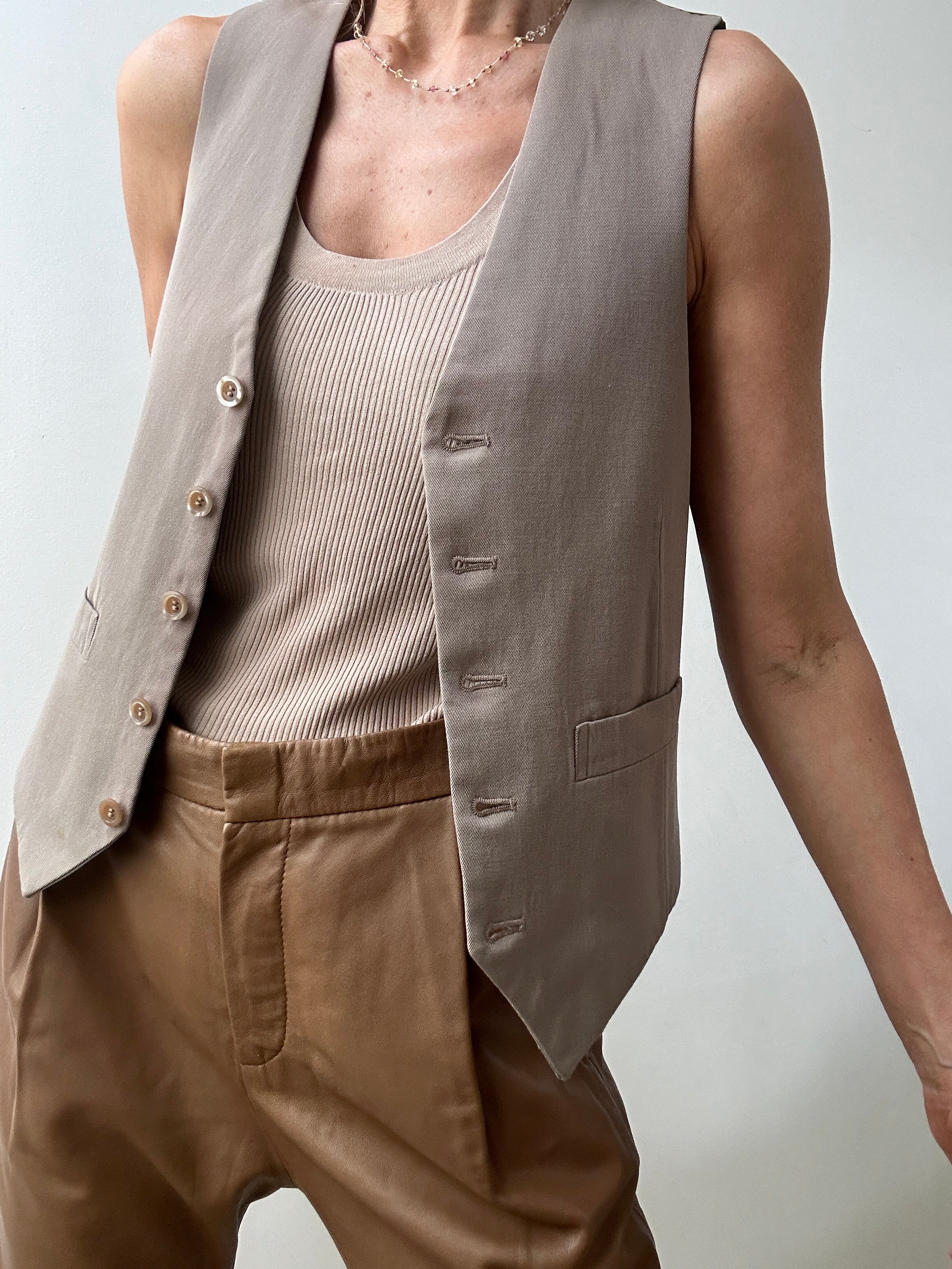 Tan sleeveless outlet vest